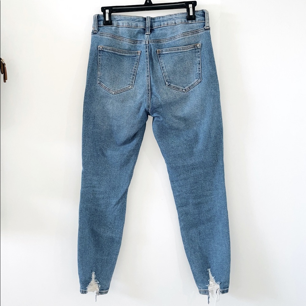 Mid-rise Ripped Skinny Jeans